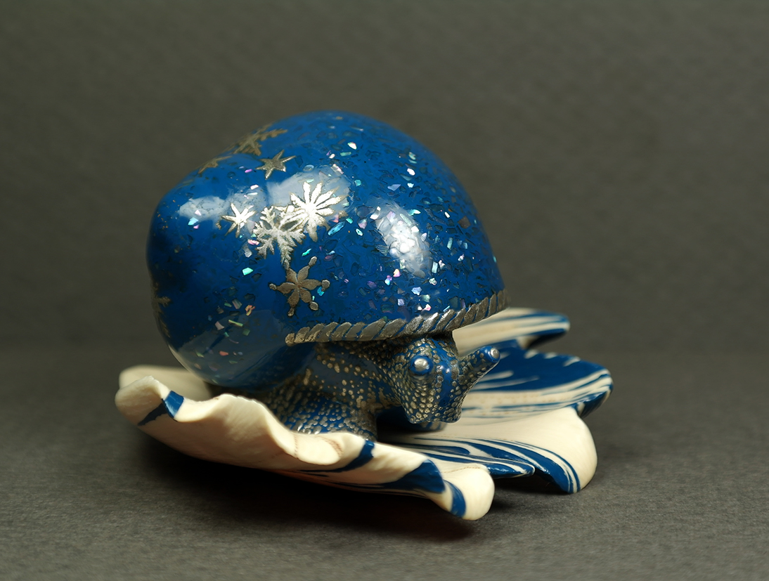 Winter snail on a petal 01